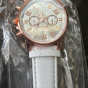 White and Rose Gold Watch with Roman Numerals